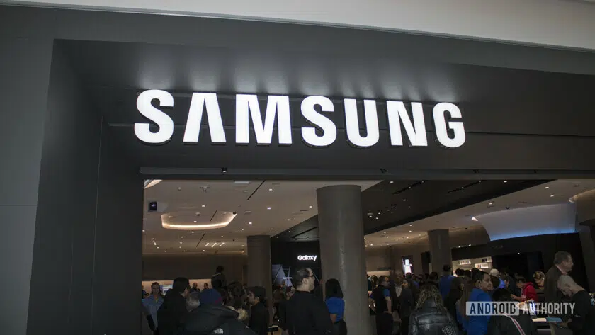 A view of the Samsung Experience Store in Long Island, from the outside looking in. The Samsung logo is above the entry.