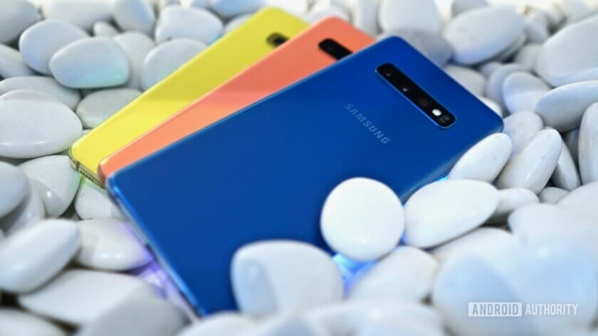 Backside photo of the new Samsung Galaxy S10 in blue, orange, and yellow color.